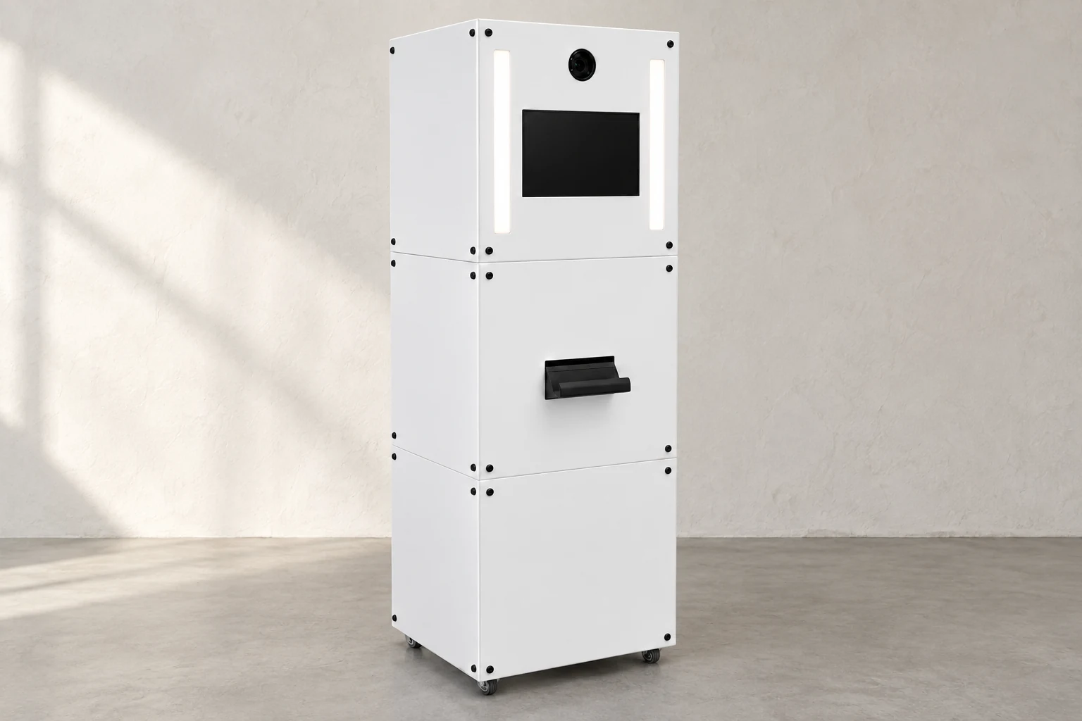 White three-module booth in a softly lit studio
